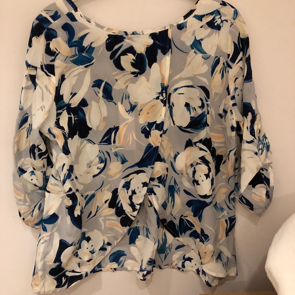 Open back three quarter sleeve brand new top